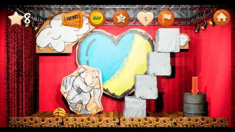 Escenario de teatro con un corazón azul y amarillo y bloques de piedra apilados